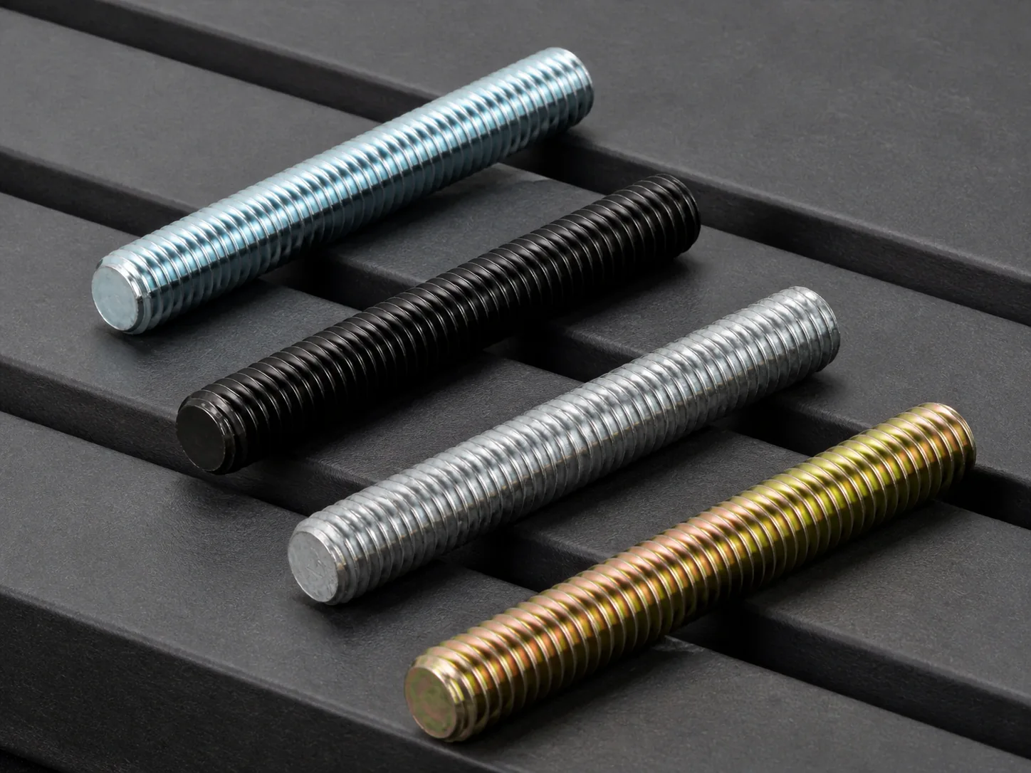 Comparison of four threaded rods with zinc-plated, black, galvanized and tropicalised finishes